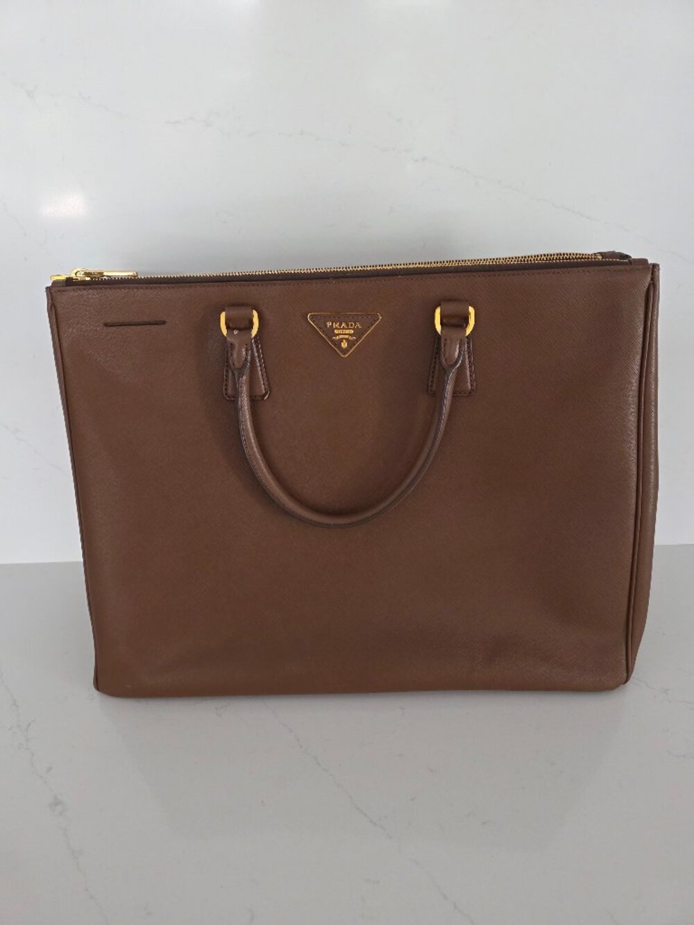 Prada Brown Leather Briefcase size (15Wx12Hx4D)